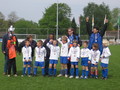 René coaches Tim's team at a cup match